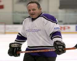 He was a hockey player while growing up and also took part in the Seattle Hockey Challenge for the Ronald McDonald House Charity.